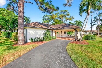 435 Pine Villa Dr in Atlantis, FL - Building Photo - Building Photo