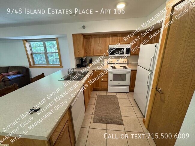 9748 Island Estates Pl-Unit -Apt 106 in Minocqua, WI - Building Photo - Building Photo