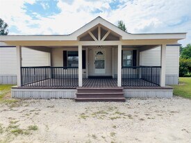 788 County Rd 3479J in Cleveland, TX - Building Photo