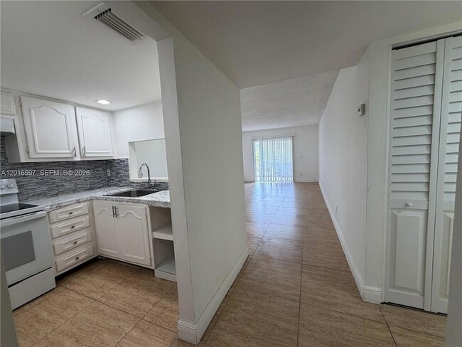 property at 13685 NE 10th Ave
