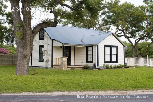 property at 102 N School St