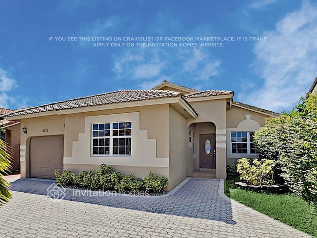 property at 8972 NW 148th St