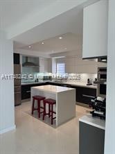 property at 5001 Collins Ave