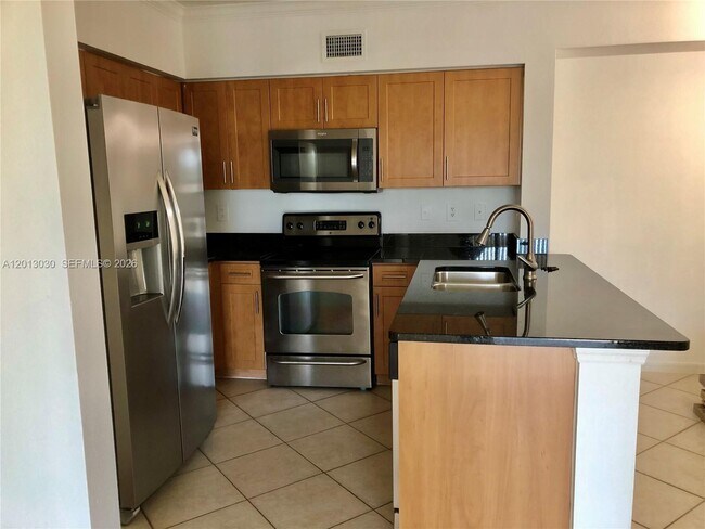 6559 Emerald Dunes Dr in Royal Palm Beach, FL - Foto de edificio - Building Photo