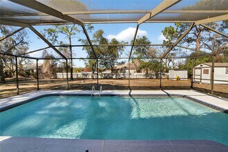 15047 Woodbury Rd in Spring Hill, FL - Building Photo - Building Photo