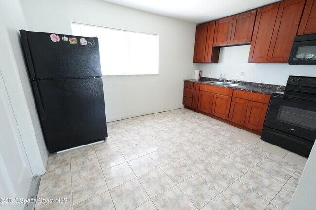 2219 Allan Adale Rd in Melbourne, FL - Foto de edificio - Building Photo