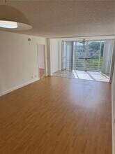 1811 Sabal Palm Dr, Unit 403 in Davie, FL - Building Photo - Building Photo
