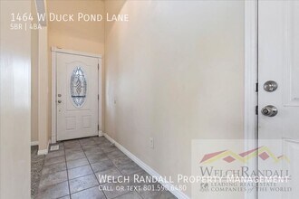 1464 W Duck Pond Ln in Taylorsville, UT - Building Photo - Building Photo