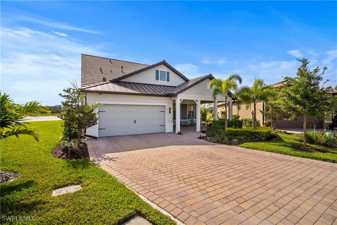 12537 Aqua Reserve Ct in Miromar Lakes, FL - Building Photo