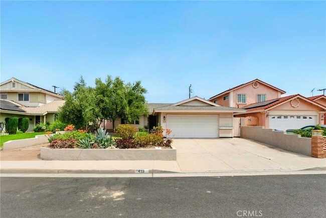 property at 413 E Bradrick Dr