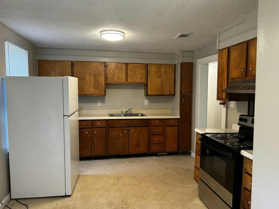 1116 Ash Ave-Unit -203 in Richton, MS - Building Photo