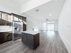 1843 Manitoba Ct, Unit 307 in Poinciana, FL - Building Photo - Building Photo