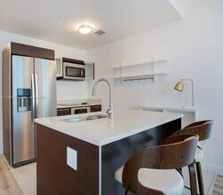 1900 N Bayshore Dr, Unit 03 in Miami, FL - Building Photo - Building Photo