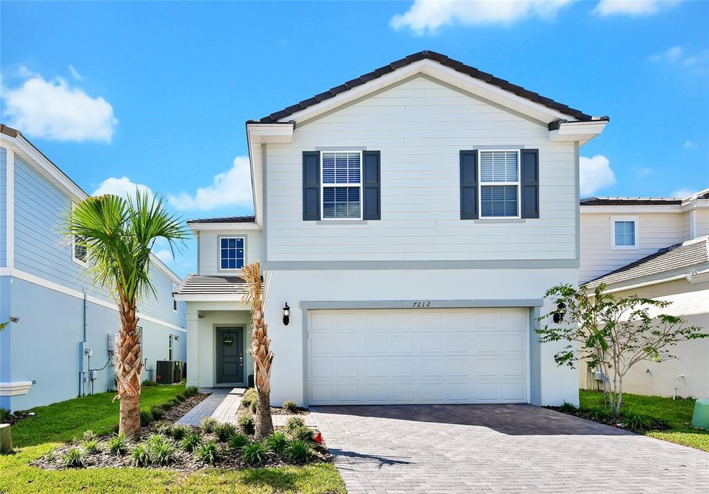 7212 Oakmoss Loop in Davenport, FL - Building Photo