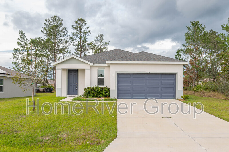 2009 Maple Ln in Kissimmee, FL - Building Photo