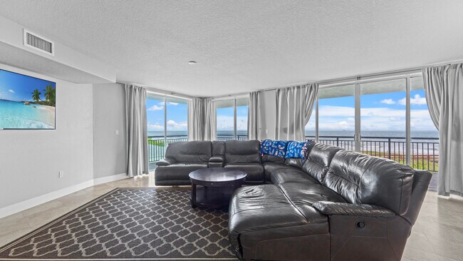 3800 Ocean Beach Blvd, Unit 201 in Cocoa Beach, FL - Building Photo - Building Photo