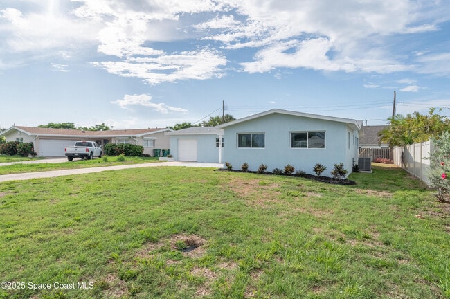 property at 122 Poinsetta St