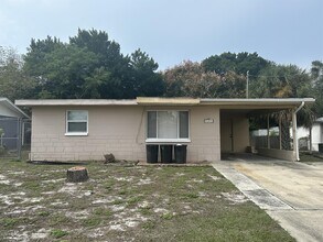 11031 Hassle Ave in Port Richey, FL - Building Photo - Building Photo