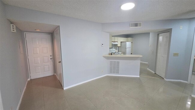 9055 Wiles Rd, Unit 5-106 in Coral Springs, FL - Building Photo - Building Photo