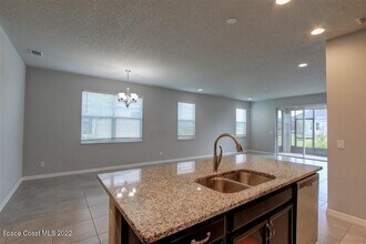 7753 Poulicny Ln in Melbourne, FL - Building Photo - Building Photo