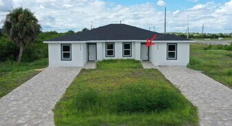 12260 Henley Ave in Port Charlotte, FL - Building Photo