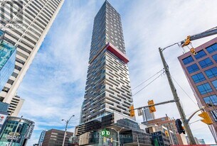 8 Eglinton Ave E in Toronto, ON - Building Photo