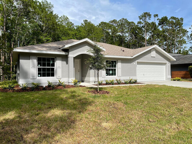 82 Utah Pl in Palm Coast, FL - Foto de edificio - Building Photo