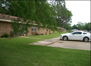 Mill Run Apartments in Elkhart, TX - Foto de edificio