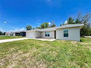 9245 SE 150th Pl in Summerfield, FL - Building Photo - Building Photo