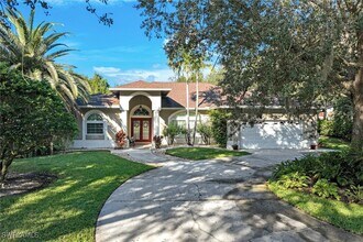 7500 Woodland Bend Cir in Ft. Myers, FL - Building Photo - Building Photo