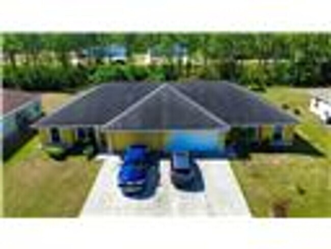 349-351 Justice Ave in Lehigh Acres, FL - Building Photo - Building Photo