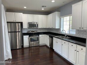 14240 W Country Gables Dr in Surprise, AZ - Building Photo - Building Photo
