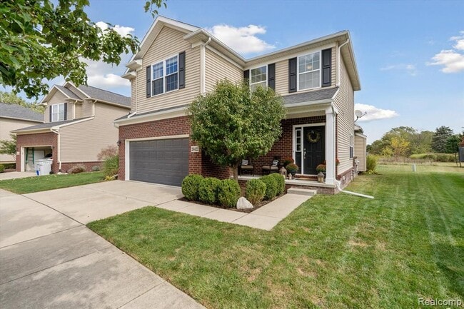 26422 Elk Run E in New Hudson, MI - Building Photo - Building Photo