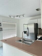 5721 Boynton Crescent in Boynton Beach, FL - Building Photo - Building Photo