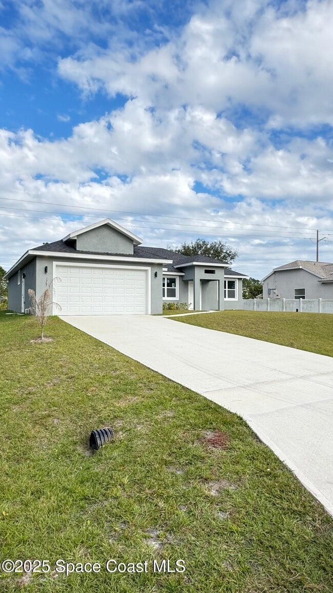 1267 Harlingen Rd SW in Palm Bay, FL - Building Photo - Building Photo