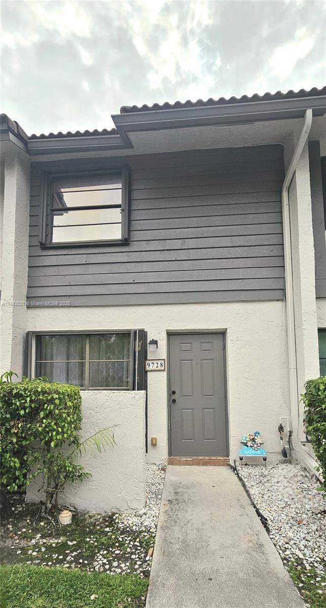 property at 9728 NW 14th St