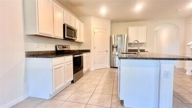 2556 Harmonia Hammock Rd in Harmony, FL - Building Photo - Building Photo