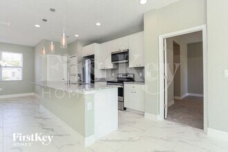 1644 Tench Ct in Poinciana, FL - Building Photo - Building Photo