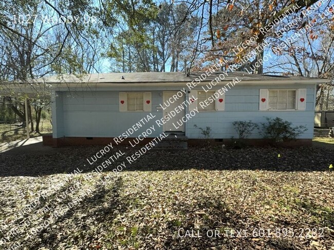 property at 1027 Woody Dr