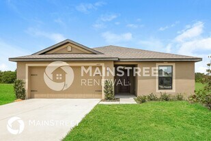 1499 Swan Lake Cir in Dundee, FL - Building Photo