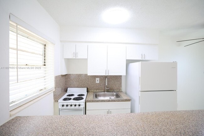 property at 7155 W 14th Ct