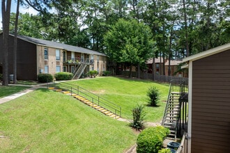 Santa Fe Trails Apartments in Huntsville, TX - Building Photo - Building Photo