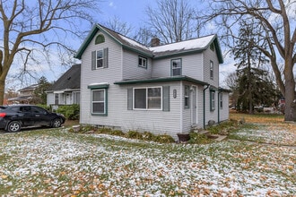 56733 Grand River Ave in New Hudson, MI - Building Photo - Building Photo