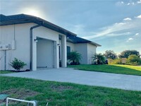 5051 Centennial Blvd in Lehigh Acres, FL - Foto de edificio - Building Photo