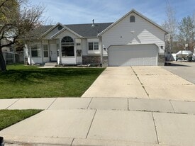 5964 W Wolf Creek Ct in West Valley City, UT - Building Photo