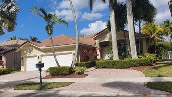2408 Deer Creek Rd in Weston, FL - Building Photo