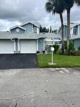 3841 Island Club Cir E in Atlantis, FL - Foto de edificio - Building Photo