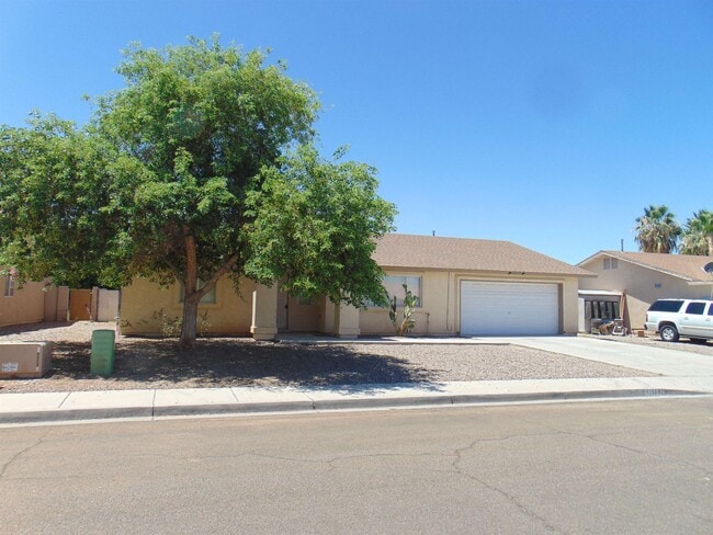 property at 11377 E 26th St