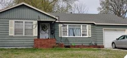 property at 905 E 11th St