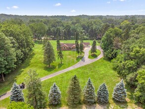 46105 W Seven Mile Rd in Northville, MI - Building Photo - Building Photo